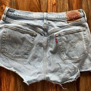 Levi’s 501 shorts. 33” around the belt. Distressed blue